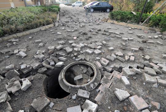 Kerusakan parah akibat ledakan dahsyat pipa Sinopec di China