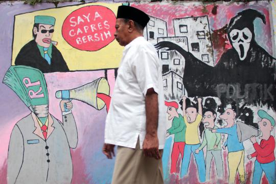 Mural di Ciputat sindir maraknya politik uang jelang Pemilu 2014