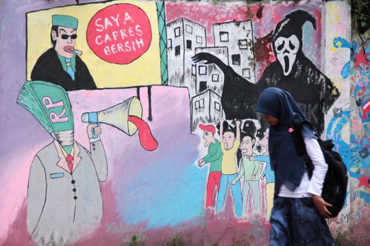 Mural di Ciputat sindir maraknya politik uang jelang Pemilu 2014