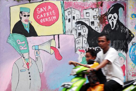 Mural di Ciputat sindir maraknya politik uang jelang Pemilu 2014