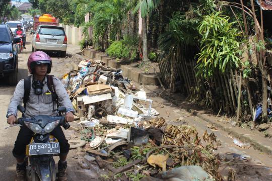 Dampak akibat banjir bandang menerjang Manado