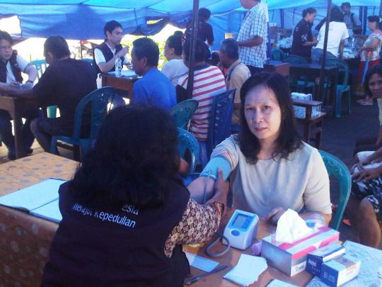 Korban banjir Manado serbu posko pengobatan gratis Garuda