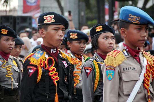 Aksi polisi cilik dan marching band Akpol di Bundaran HI