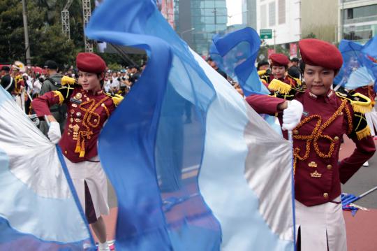 Aksi polisi cilik dan marching band Akpol di Bundaran HI