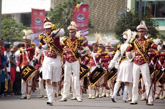 Aksi polisi cilik dan marching band Akpol di Bundaran HI