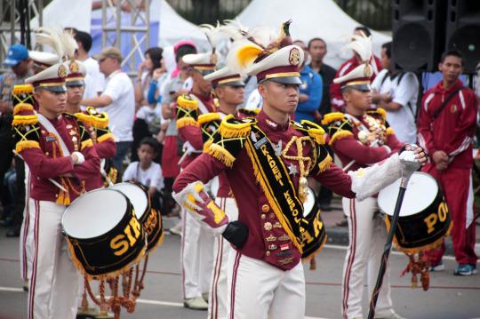 Aksi polisi cilik dan marching band Akpol di Bundaran HI
