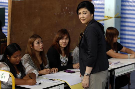 Ekspresi PM Yingluck Shinawatra saat ikuti Pemilu Thailand