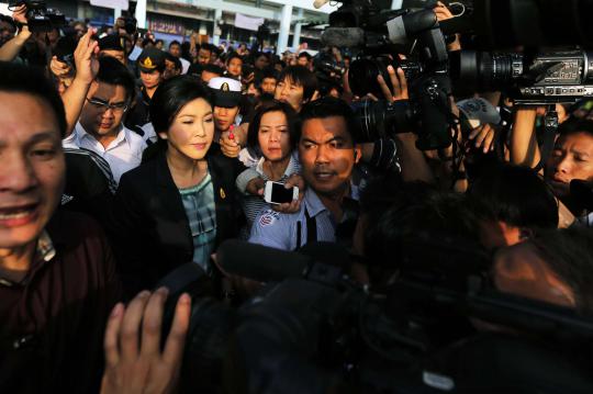 Ekspresi PM Yingluck Shinawatra saat ikuti Pemilu Thailand