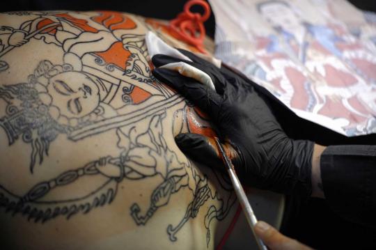 Kemeriahan festival tato Mondial du Tatouage di Paris