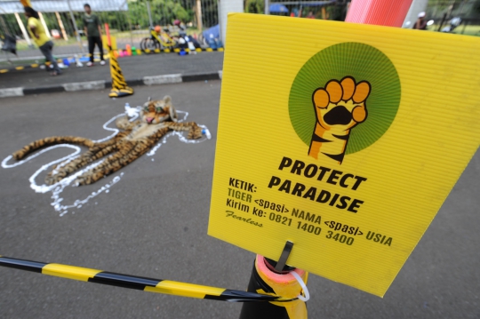 Aksi simpatik Greenpeace serukan penyelamatan hutan dan harimau