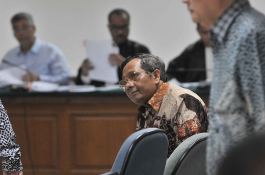 Mahfud MD bersaksi dalam sidang lanjutan Akil Mochtar