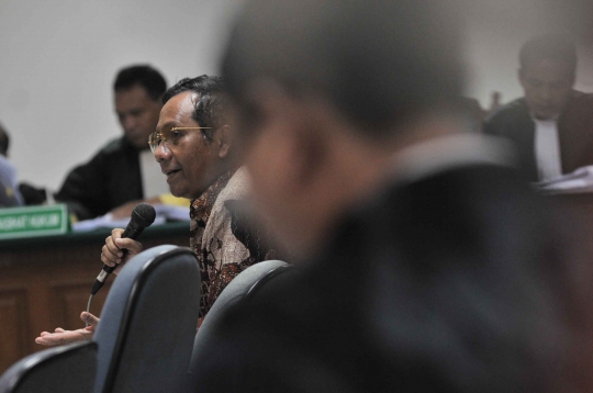 Mahfud MD bersaksi dalam sidang lanjutan Akil Mochtar