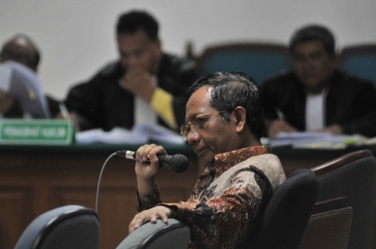 Mahfud MD bersaksi dalam sidang lanjutan Akil Mochtar