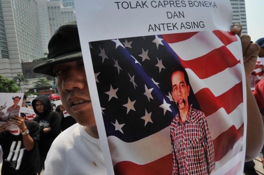 Aksi menolak pencapresan Jokowi di Bundaran HI
