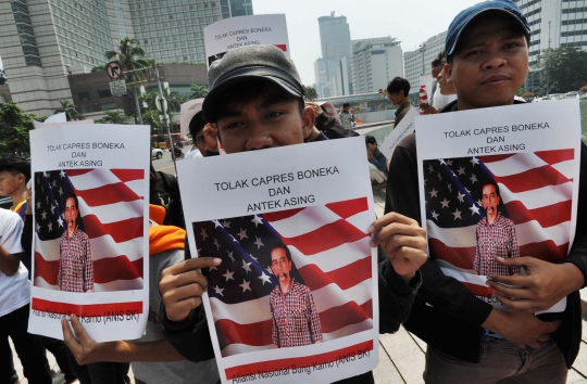 Aksi menolak pencapresan Jokowi di Bundaran HI