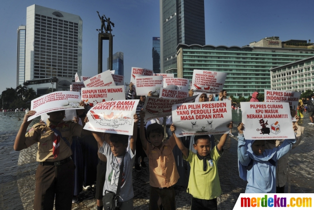 Foto : Aksi simpatik pelajar imbau Pilpres 2014 damai 