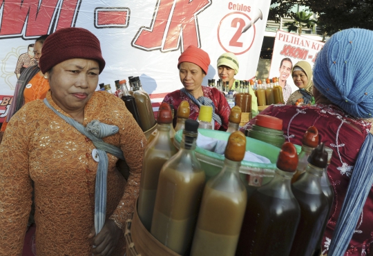 Aksi para penjual jamu gendong dukung Jokowi-JK