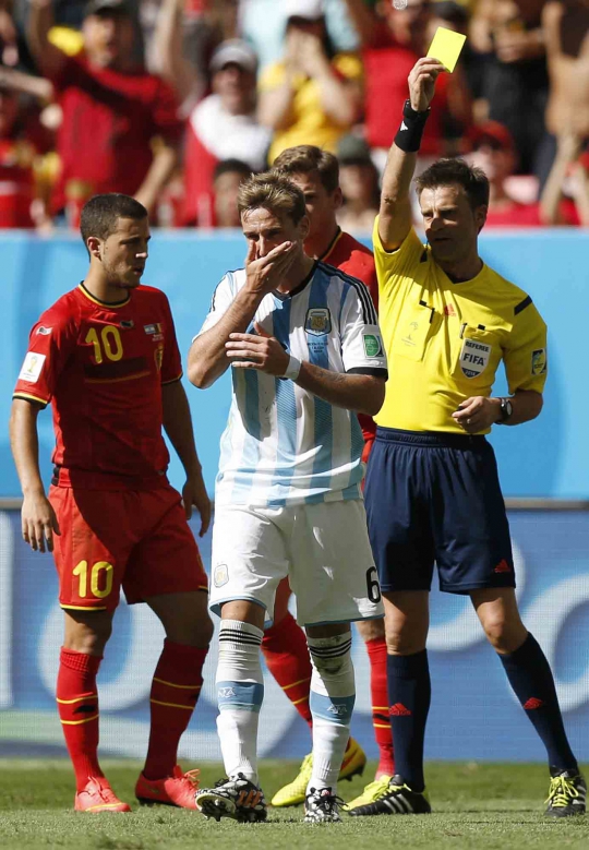 Melihat kinerja Nicola Rizzoli, wasit final Piala Dunia 2014