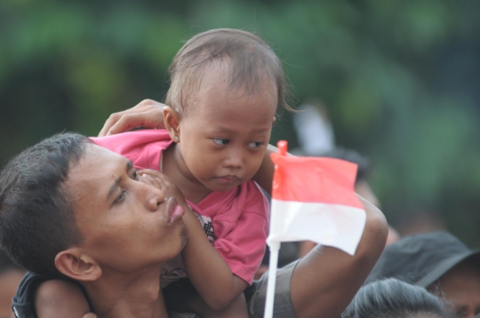 Sorak-sorai para relawan rayakan kemenangan Jokowi