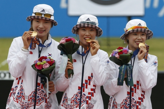 Tradisi gigit medali di Asian Games 2014