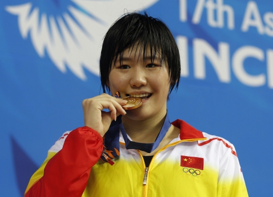 Tradisi gigit medali di Asian Games 2014