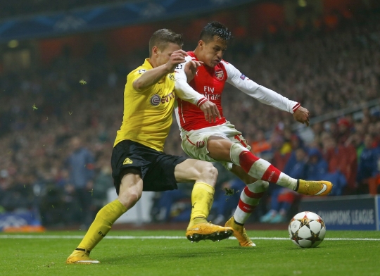 Gol Sanchez dan Sanogo antar Arsenal lolos ke 16 besar