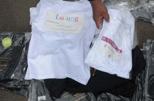 Ini kaos #SaveHajiLulung yang laku keras di Car Free Day