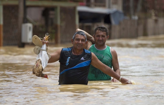 Parahnya banjir yang paksa puluhan ribu warga Brasil mengungsi