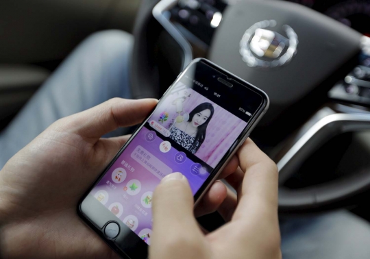 Mengintip kesibukan wanita Beijing bekerja jadi penghibur online