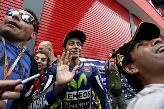 Gaya Rossi naik motor bebek di MotoGP Argentina