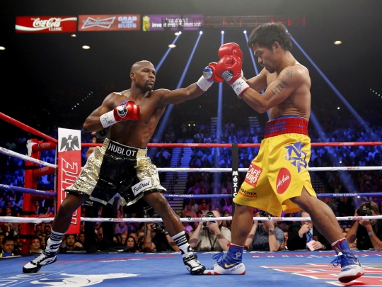 Begini sengitnya pertarungan Pacquiao dan Mayweather