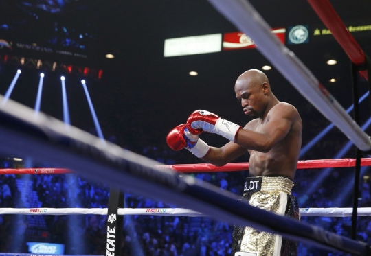 Begini sengitnya pertarungan Pacquiao dan Mayweather