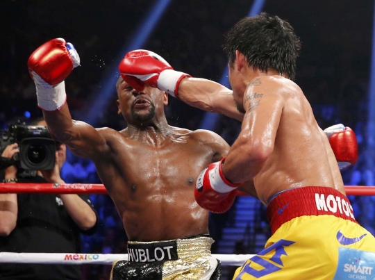 Begini sengitnya pertarungan Pacquiao dan Mayweather