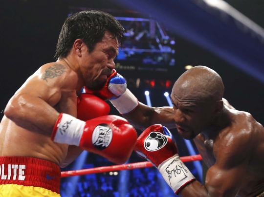 Begini sengitnya pertarungan Pacquiao dan Mayweather