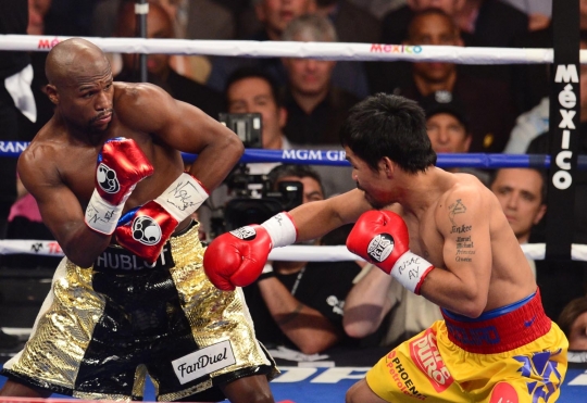 Begini sengitnya pertarungan Pacquiao dan Mayweather