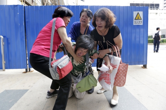 Puing di La Reunion dipastikan MH370, keluarga korban histeris