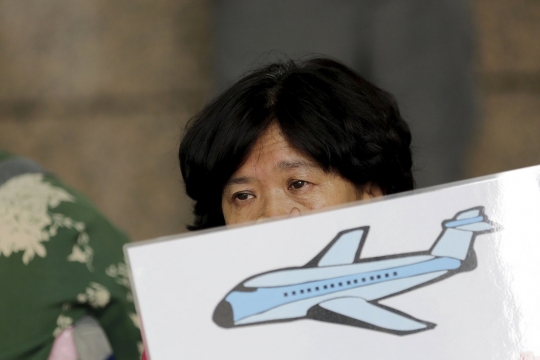 Puing di La Reunion dipastikan MH370, keluarga korban histeris