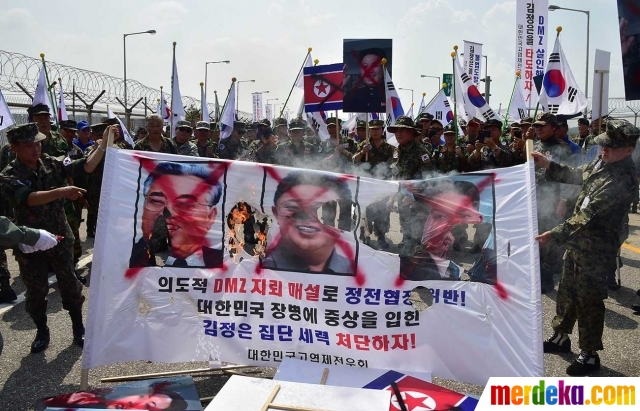 Foto : Kemarahan Korsel bakar bendera Korut & tuntut Kim 