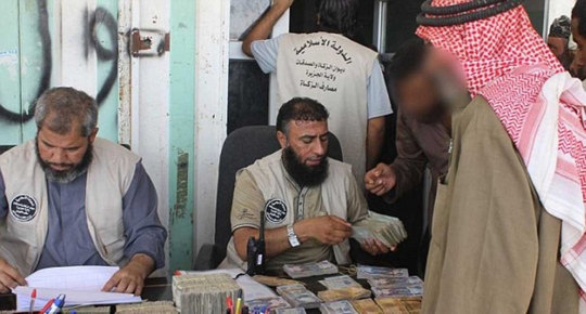 ISIS bagi-bagi uang hasil merampok bank ke warga miskin