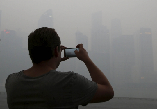 Beginilah pemandangan kabut asap semakin tebal selimuti Singapura