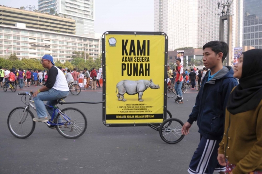 Aksi kampanye selamatkan badak Jawa dan Sumatera di Bundaran HI