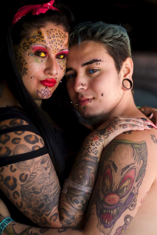 Penampilan para penggila tato ekstrem di Quito Tattoo Convention