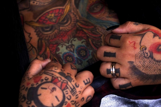Penampilan para penggila tato ekstrem di Quito Tattoo Convention