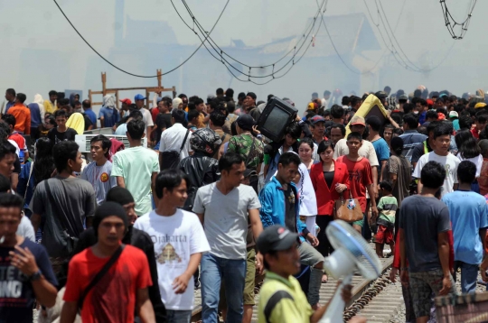 Suasana kepanikan warga saat kebakaran Kampung Bandan