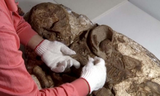 Penemuan kerangka wanita peluk anak di Taiwan berusia 4.800 tahun