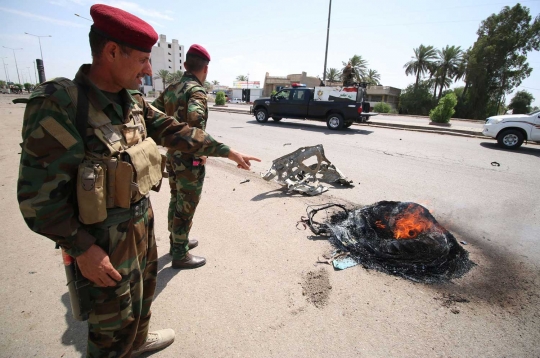 Tiga ledakan dahsyat bom mobil tewaskan 14 orang di Irak