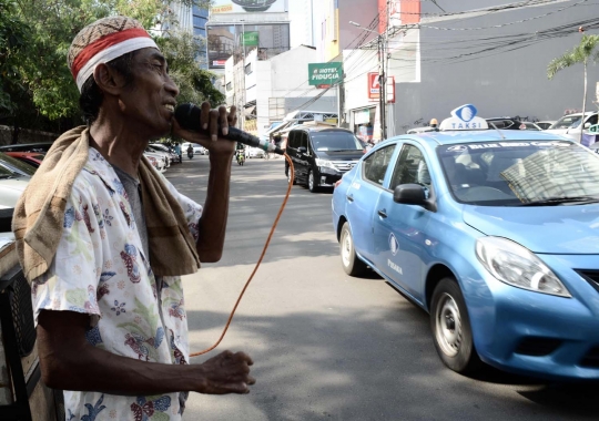 Potret perjuangan pengamen bertahan hidup melawan kerasnya Jakarta