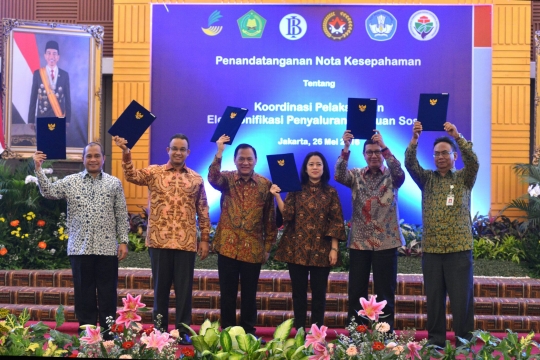 Penandatanganan nota kesepahaman elektronifikasi pembayaran bansos