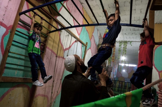 Menengok taman bermain bawah tanah di Suriah