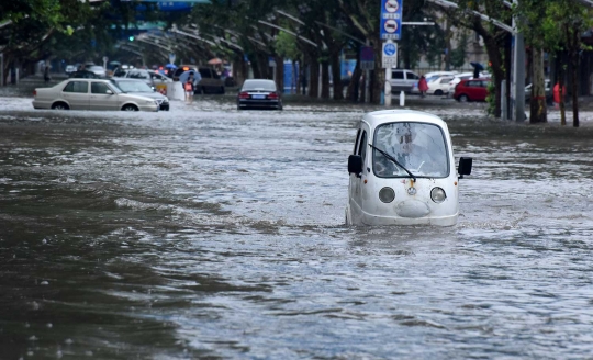 Hujan lebat kembali menambah parah banjir di China